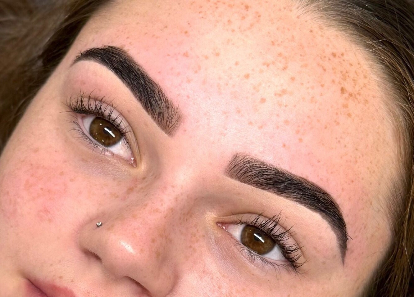 Beautifully shaped eyebrows at Studio Bloom Beauty, Cattai, New South Wales, AU, showcasing expert grooming.