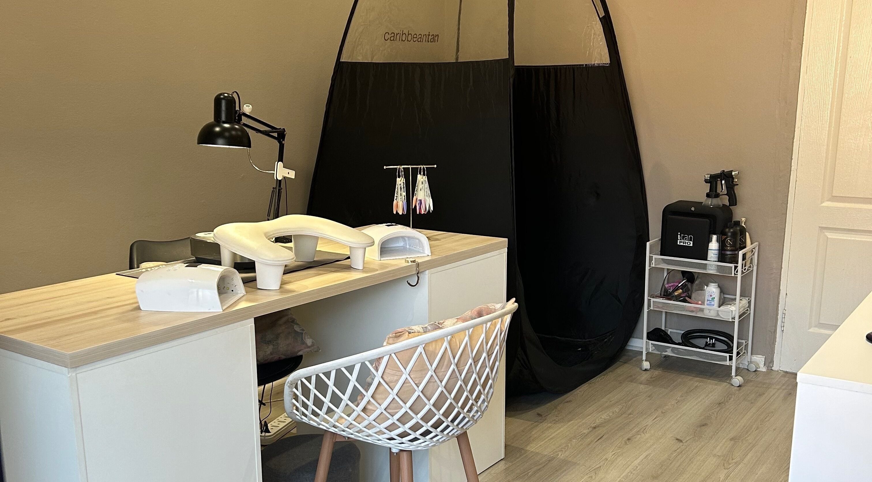Elegant manicure setup at Nails By Chloe, Johannesburg, Gauteng, ZA featuring modern nail tools and a chic chair.
