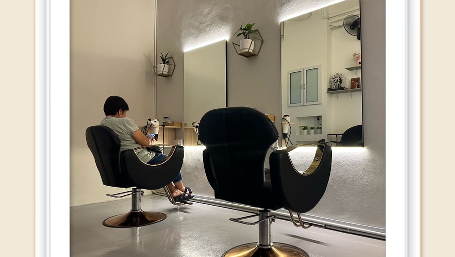 Modern salon interior at Hair Lover Salon, Klang, Selangor, MY with stylish chairs and illuminated mirrors.