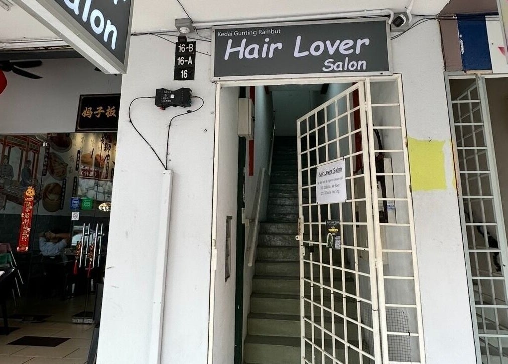 Entrance of Hair Lover Salon in Klang, Selangor, MY, showcasing a welcoming sign and staircase.