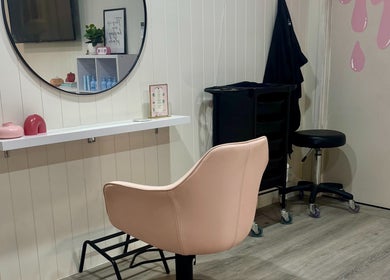Elegant styling chair in Pink Honey Hair Studio, Lake Macdonald, Queensland, AU, with a modern decor aesthetic.