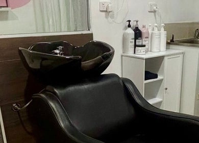 Elegant shampoo station at Pink Honey Hair Studio, Lake Macdonald, Queensland, AU, showcasing comfort and style.