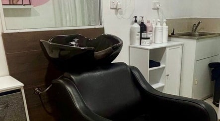 Elegant shampoo station at Pink Honey Hair Studio, Lake Macdonald, Queensland, AU, showcasing comfort and style.