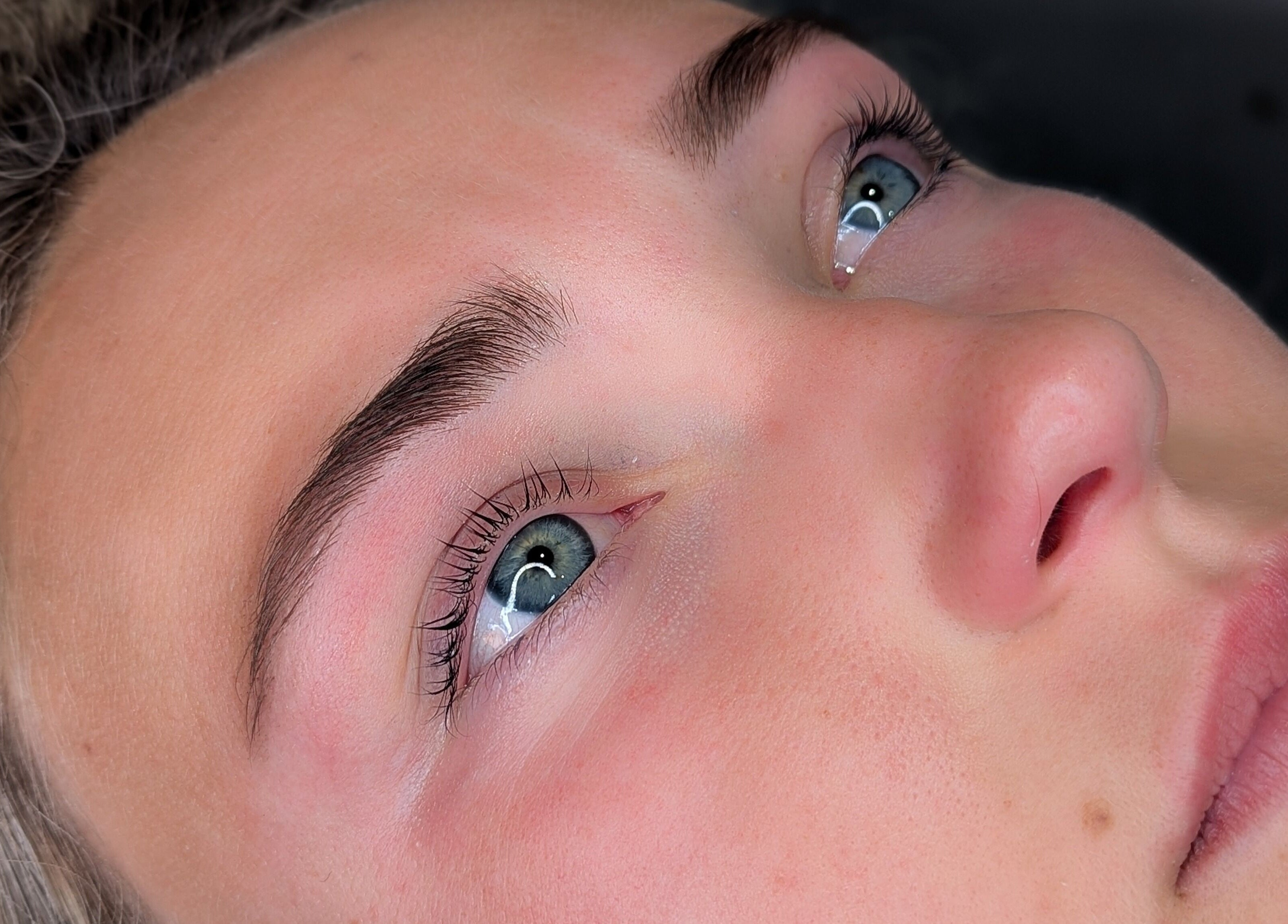 Close-up of expertly shaped eyebrows at Brows by Bettina, Tadley, England, GB. Enhancing natural beauty.