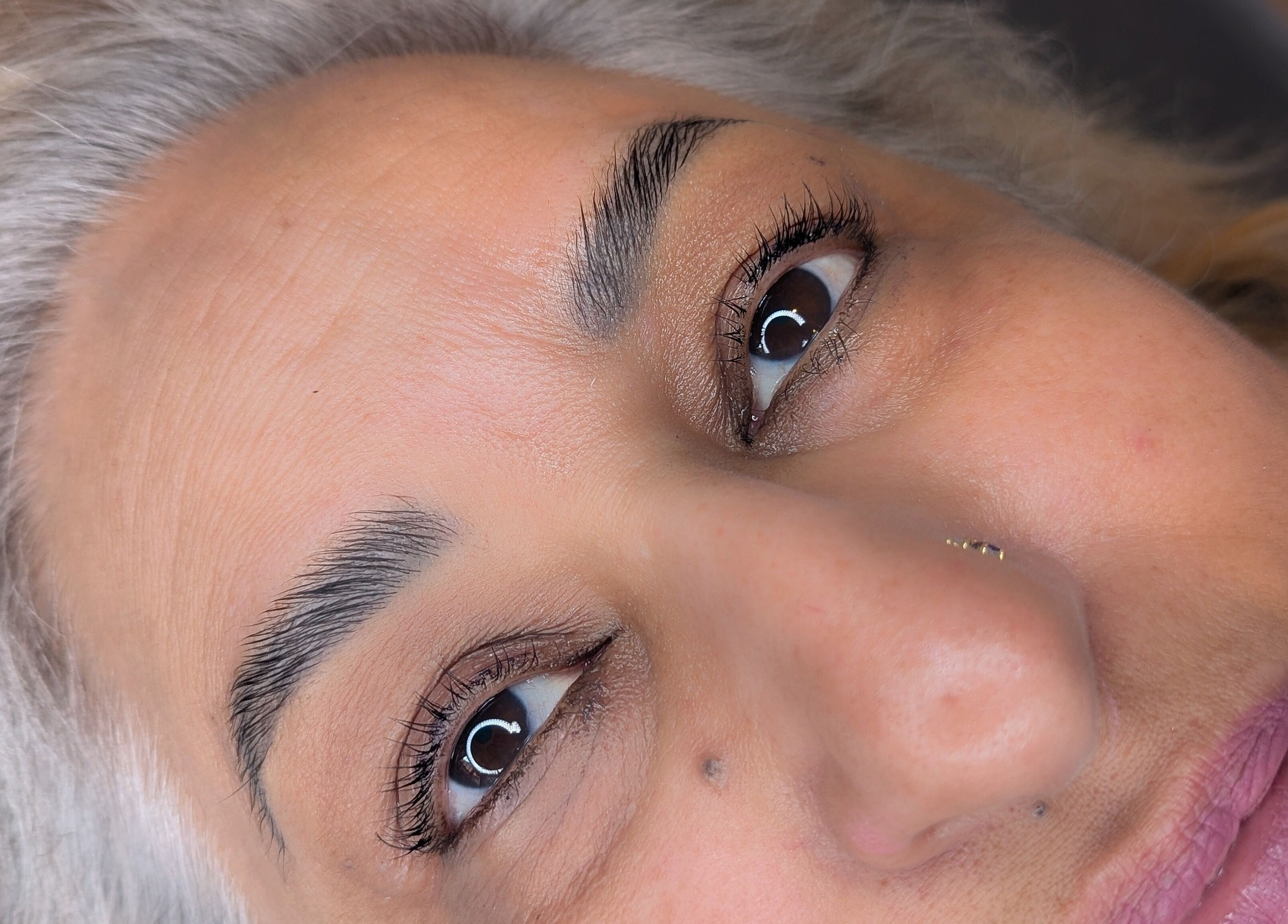 Close-up of a client's beautifully shaped eyebrows at Brows by Bettina, Tadley, England, GB.