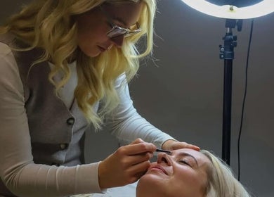 Aesthetician performing a facial treatment at Zen Den Beauty and Wellbeing Centre, Humberston, GB.