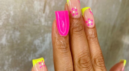 Vibrant neon pink and yellow floral nails at Iconic Nail Bar, Johannesburg South, Gauteng, ZA.