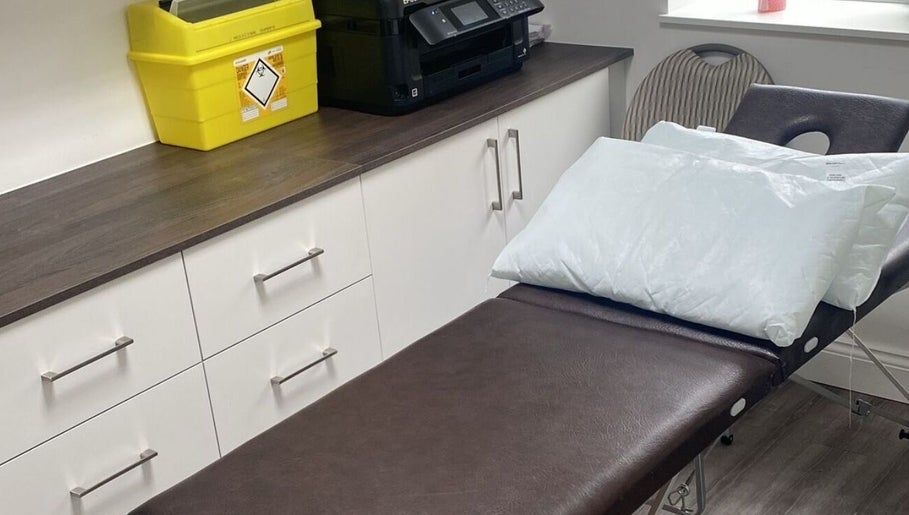 Comfortable treatment bed at Skin by Dhreena & Beauty by Dhreena, Watford, England, GB.