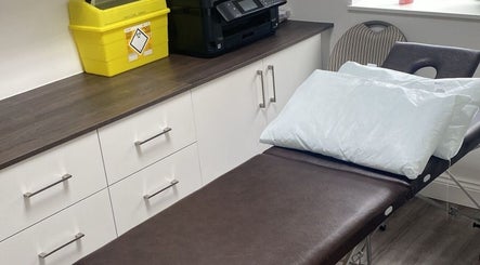 Comfortable treatment bed at Skin by Dhreena & Beauty by Dhreena, Watford, England, GB.