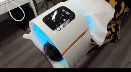 LED facial treatment at Skin by Dhreena & Beauty by Dhreena, Watford, England, GB, enhancing skin radiance.