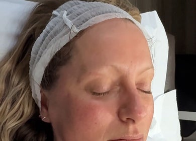 Relaxing facial at Skin by Dhreena & Beauty by Dhreena, Watford, England, GB, woman resting peacefully.