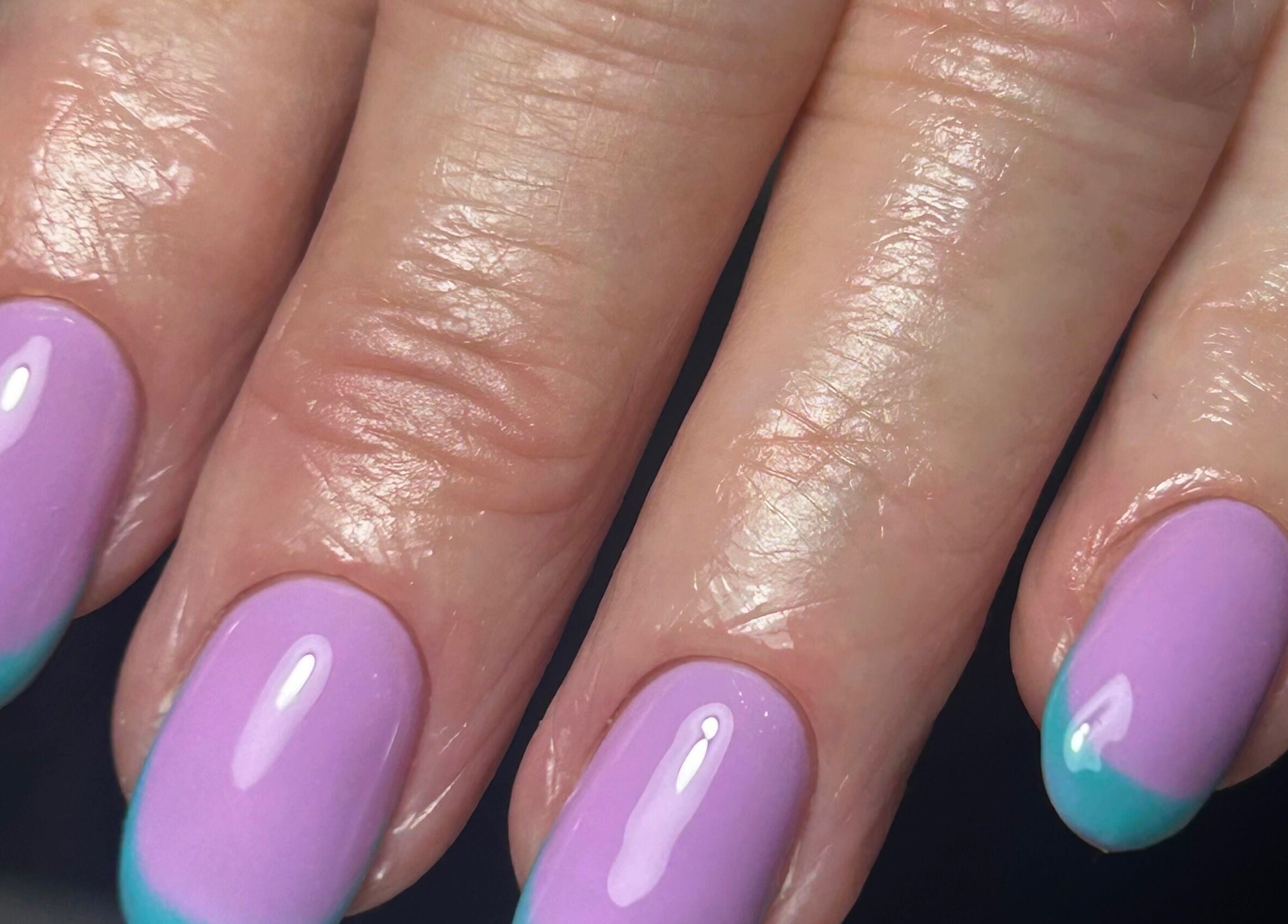 Elegant pastel nails with a blue french tip at nailsbyaoifemc, Derry, Northern Ireland, GB.