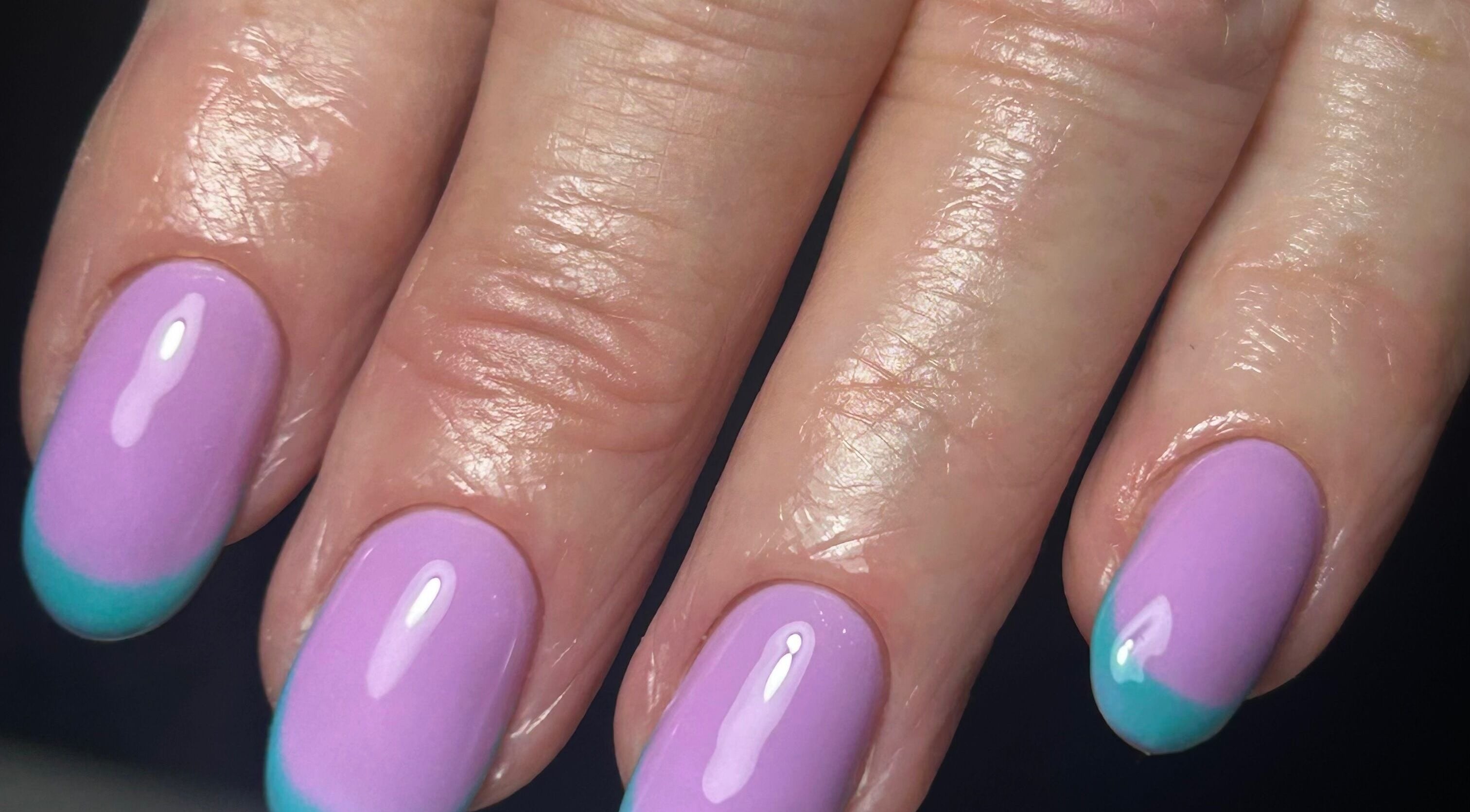 Elegant pastel nails with a blue french tip at nailsbyaoifemc, Derry, Northern Ireland, GB.