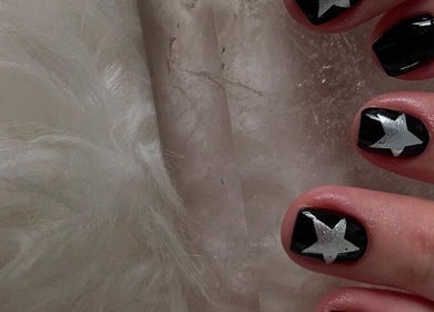 Elegant star-themed nail art at San Vee Beauty Bar, Cape Town, Western Cape, ZA. Perfect for a chic style.