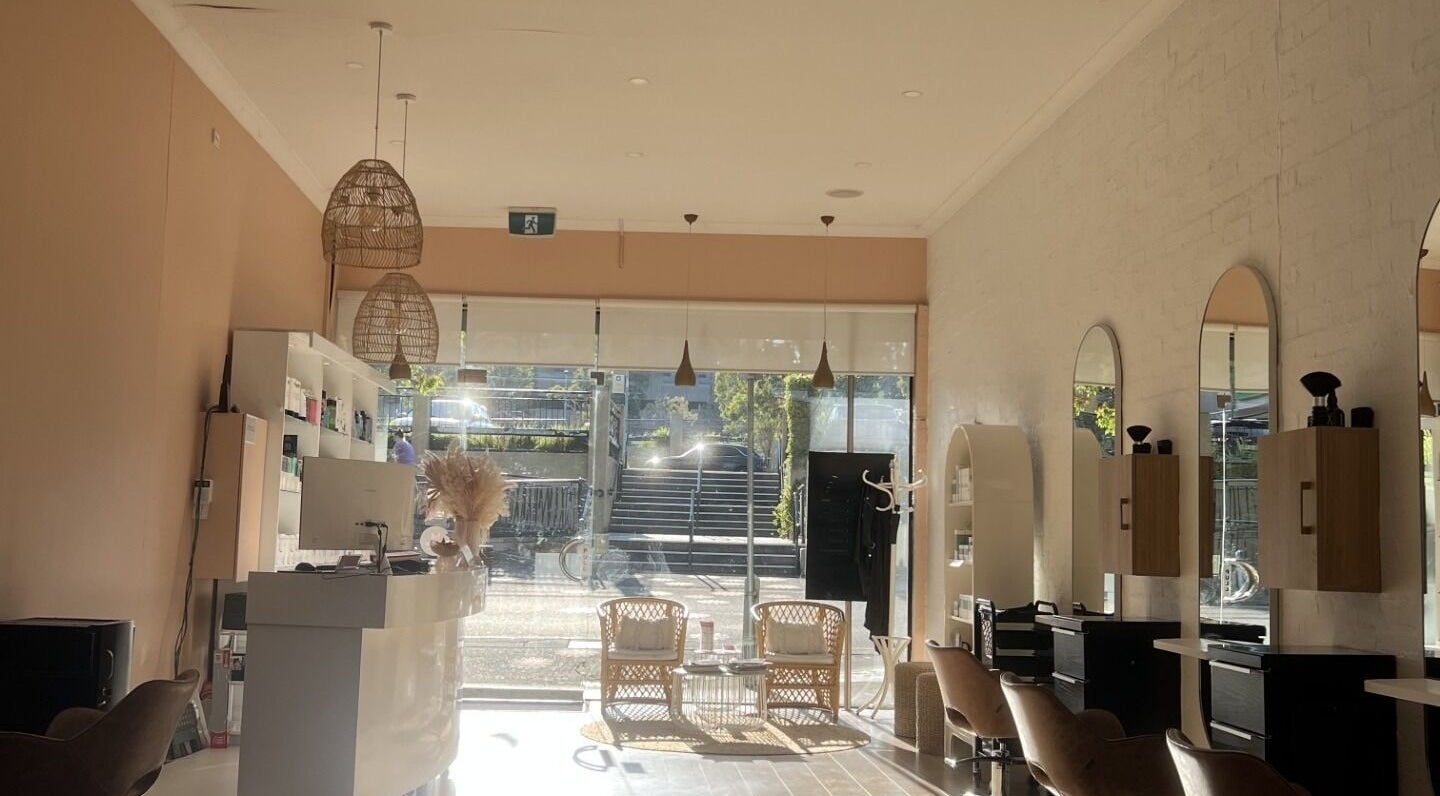 Elegant interior of JC Skin Therapy, Melbourne, Victoria, AU featuring natural lighting and chic salon decor.