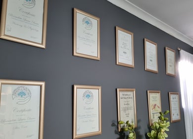 Framed certificates on wall at Pure Indulgenz Beauty Salon in Cape Town, Western Cape, ZA.