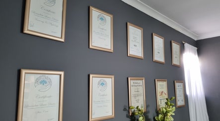 Framed certificates on wall at Pure Indulgenz Beauty Salon in Cape Town, Western Cape, ZA.