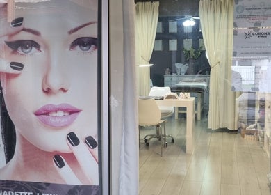 Chic entry of Pure Indulgenz Beauty Salon in Cape Town, Western Cape, ZA with stylish decor and beauty posters.