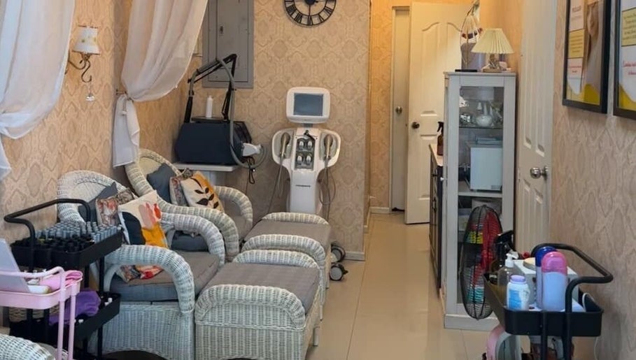 Elegant treatment area at Lemon Beauty, Parañaque, Metro Manila, PH showcasing comfortable seating and equipment.