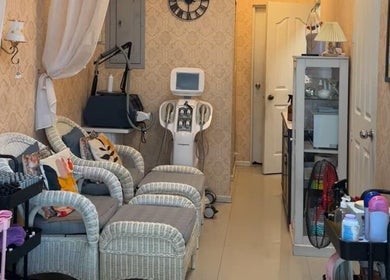 Elegant treatment area at Lemon Beauty, Parañaque, Metro Manila, PH showcasing comfortable seating and equipment.
