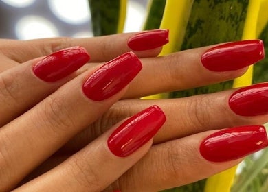 Radiant red manicured nails by Sisters Beauty Home Service, Riyadh, Riyadh Province, SA.