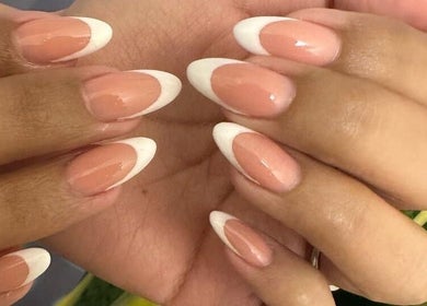 Chic French manicure at Sisters Beauty Home Service, Riyadh, Riyadh Province, SA.