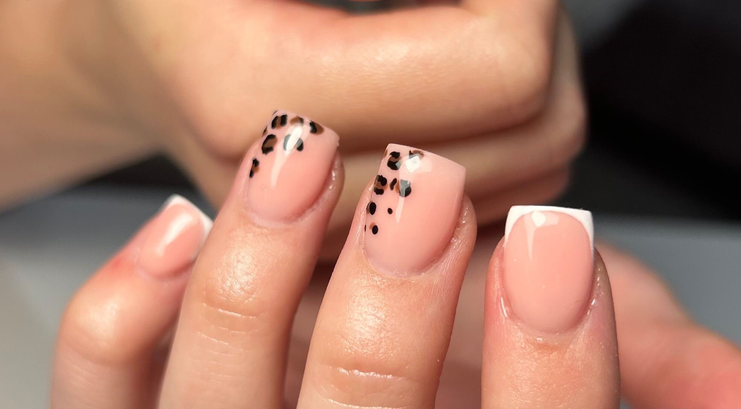 Stylish leopard print nail art at Sylvia Vanessa, Manchester, England, GB.