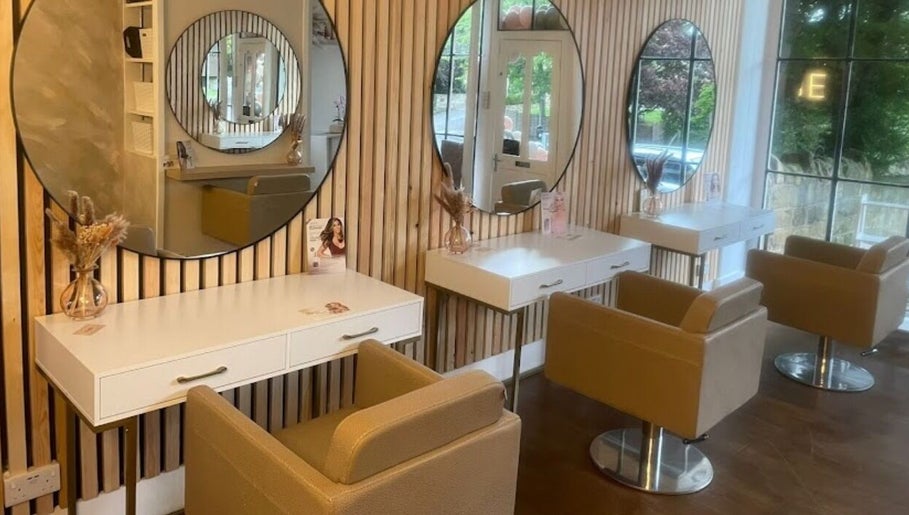 Modern, chic styling area at Stephanie One Hair Spa East Keswick, East Keswick, England, GB with large mirrors.