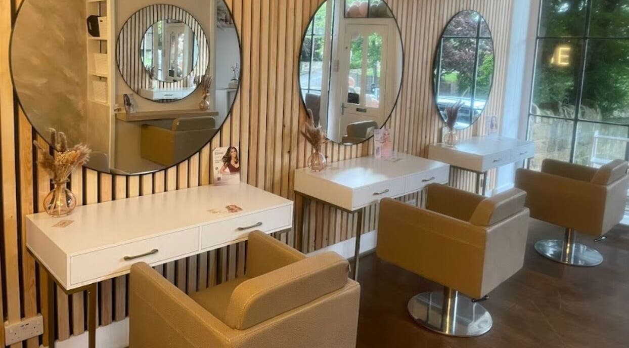 Modern, chic styling area at Stephanie One Hair Spa East Keswick, East Keswick, England, GB with large mirrors.