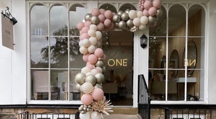 Festive balloon arch adorns the entrance of Stephanie One Hair Spa East Keswick, East Keswick, England, GB.