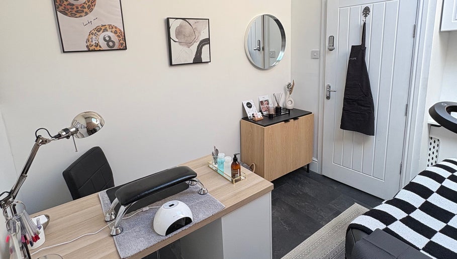 Modern nail station at Allurè Beauty, New Tupton, England, GB highlighting stylish decor and tools.