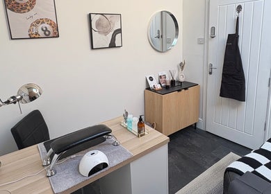 Modern nail station at Allurè Beauty, New Tupton, England, GB highlighting stylish decor and tools.