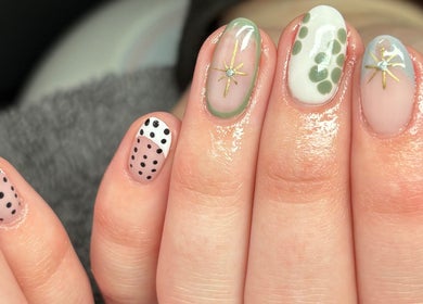 Stylish polka dot and star nail art at Allurè Beauty, New Tupton, England, GB.