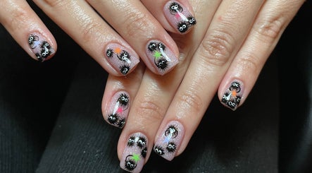 Intricate nail art with cartoon designs at Lizeth Nailed It, Berlin, Berlin, DE.