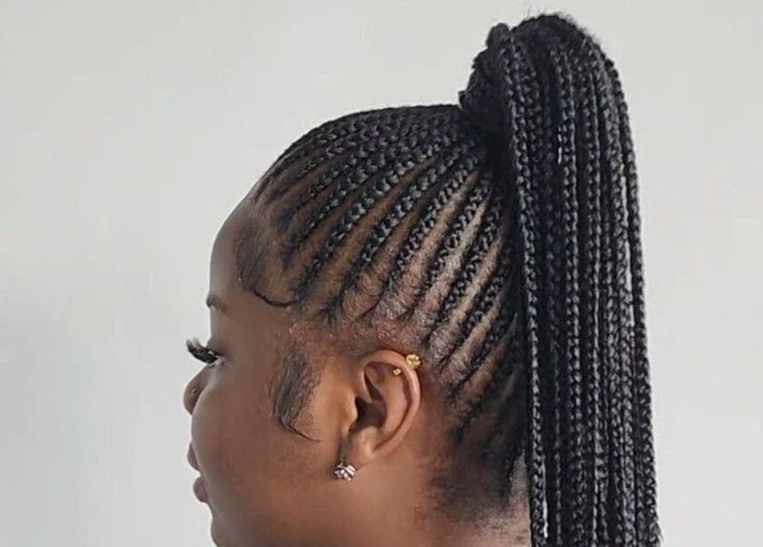 Intricate braided hairstyle at Buti Haven By Yhen in Montego Bay, St. James Parish, JM.