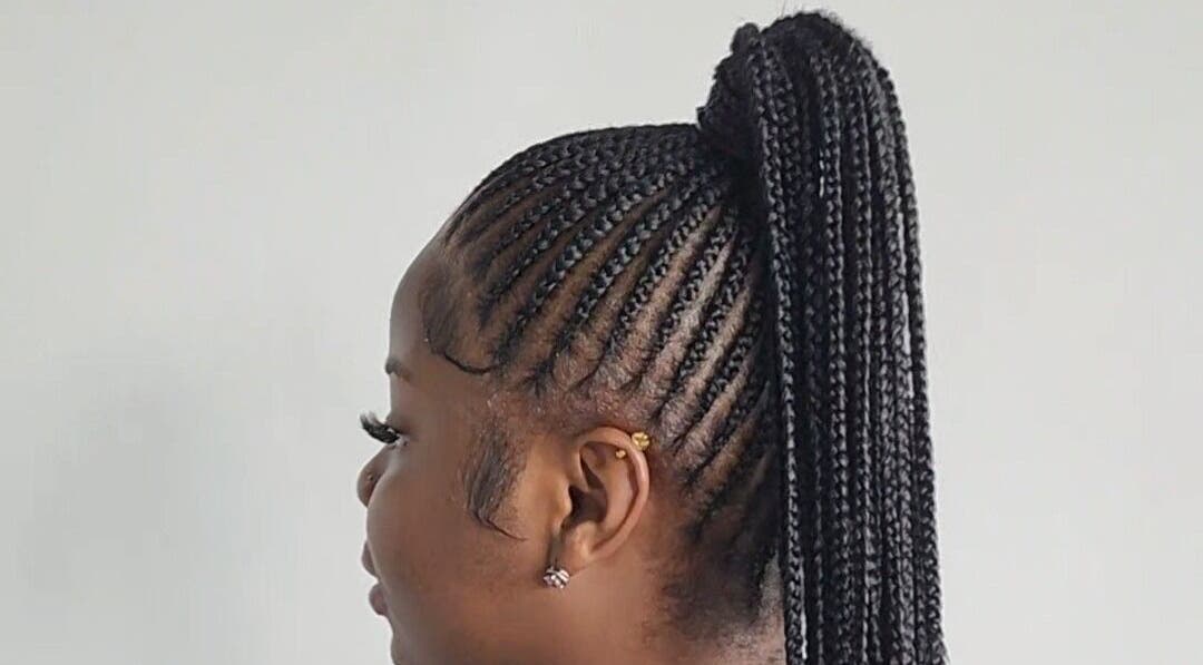 Intricate braided hairstyle at Buti Haven By Yhen in Montego Bay, St. James Parish, JM.