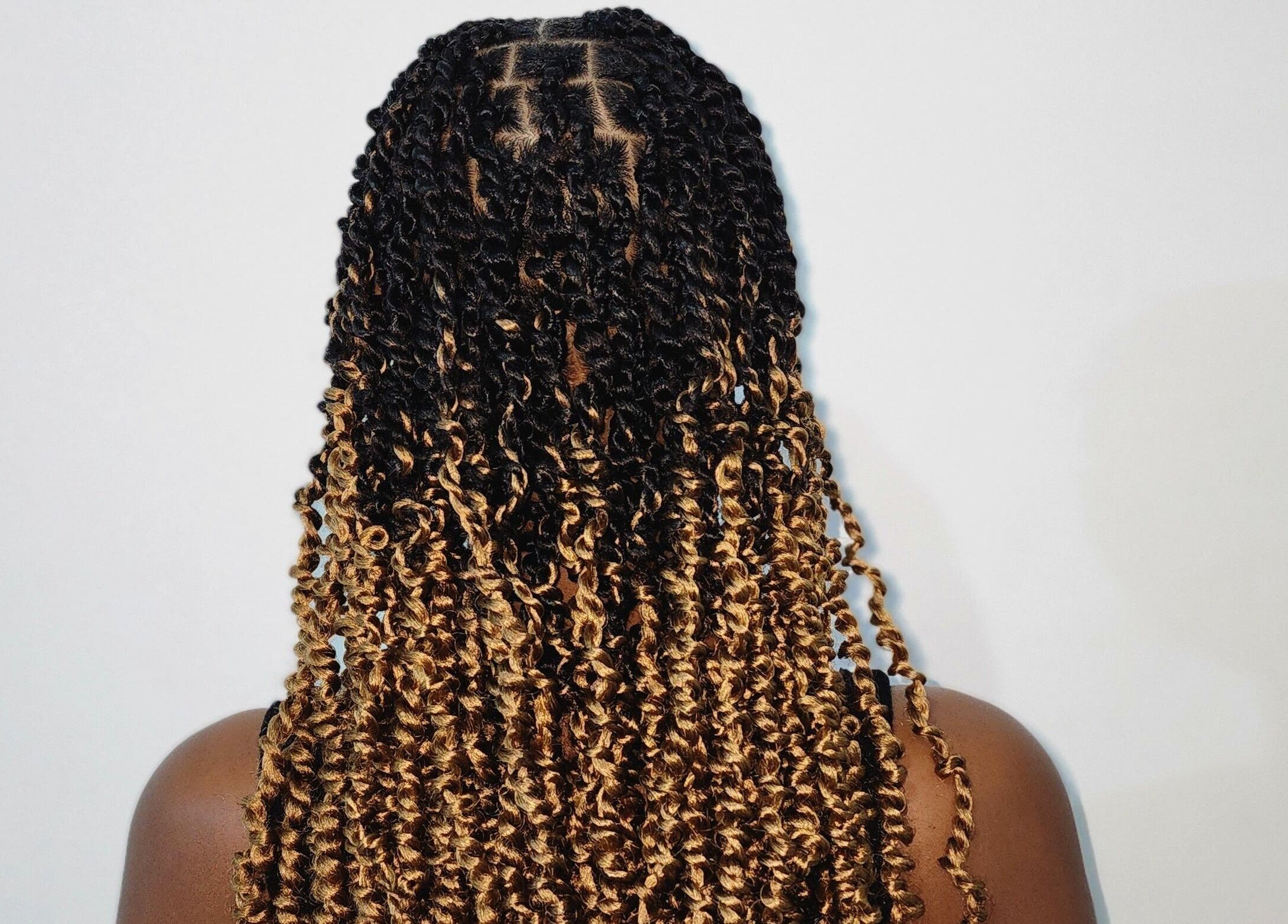 Intricate braids at Buti Haven By Yhen, Montego Bay, St. James Parish, JM. Perfect styling in luxury setting.