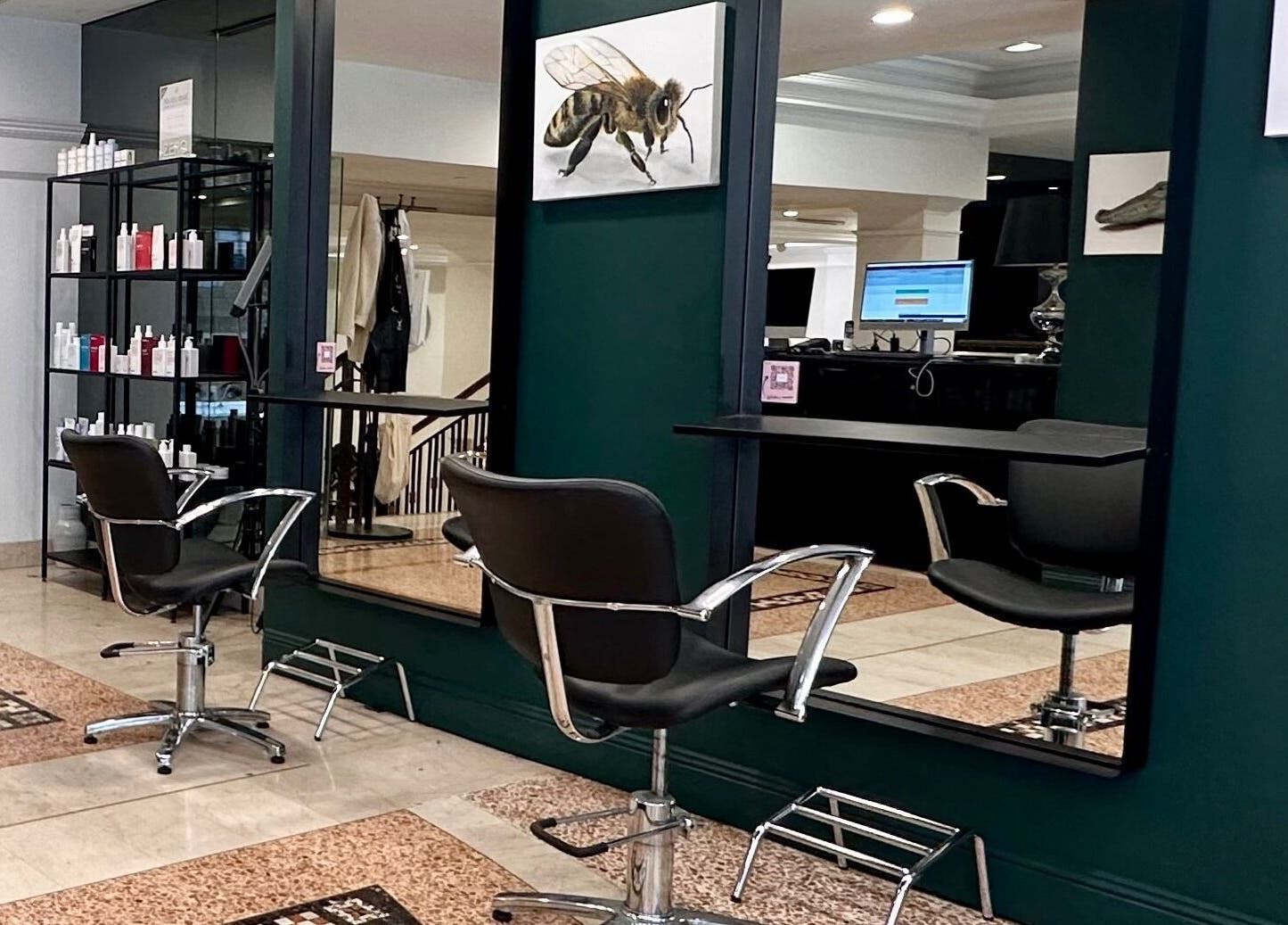 Modern salon chair and mirror at Hair By Shlomi in Sydney, New South Wales, AU.