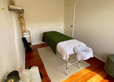 Massage table at Balanced Taurus Massage Therapy in Halls Head, Western Australia, AU with calming decor.