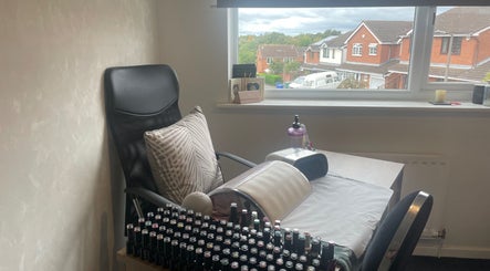Nail station at The Beautician - Beauty by Charlotte in Cannock, England, GB, showcasing a cozy workspace with supplies.