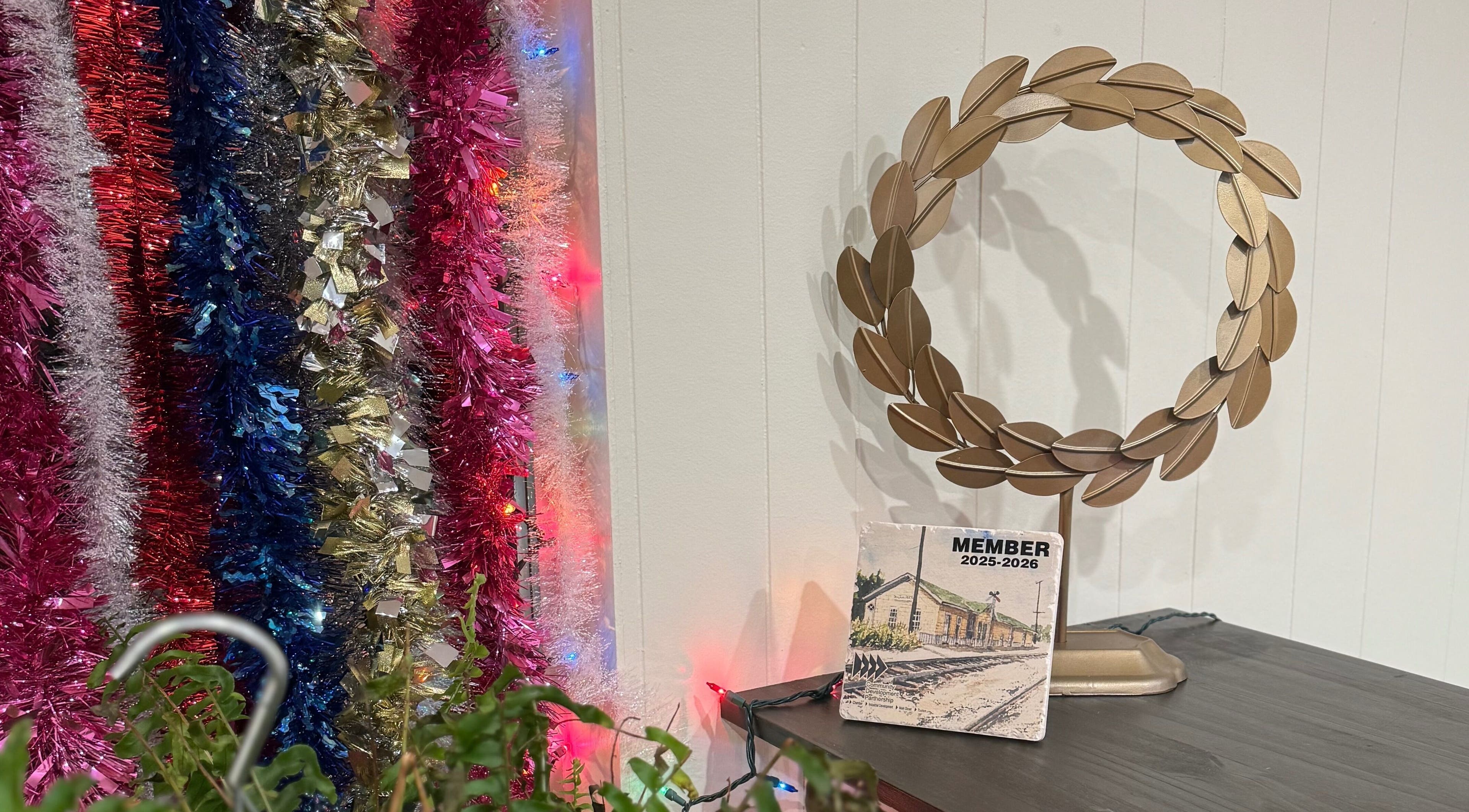 Festive decor and gold wreath at Fair City Faces, Philadelphia, Mississippi, US.