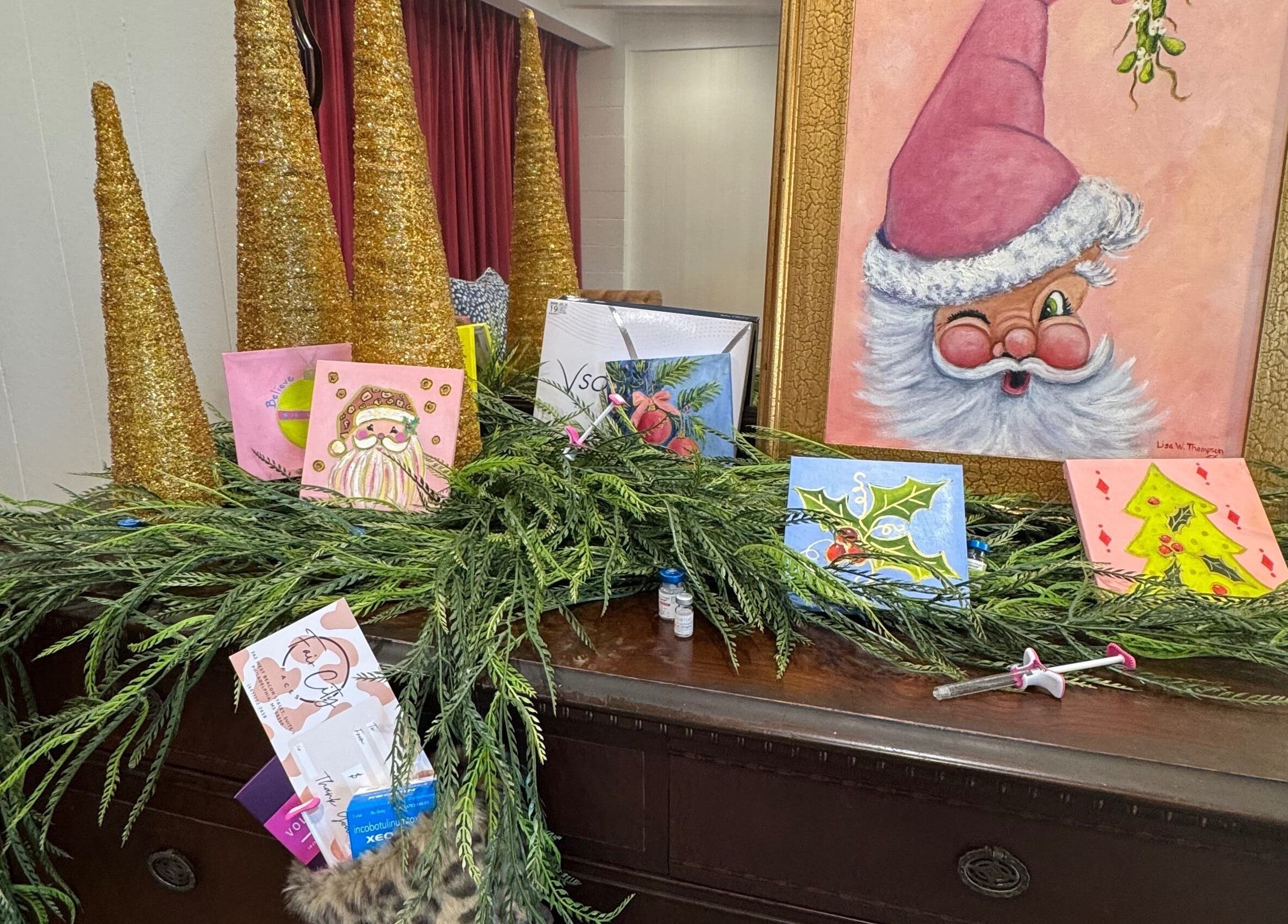 Festive display at Fair City Faces in Philadelphia, Mississippi, US with holiday cards and decor.
