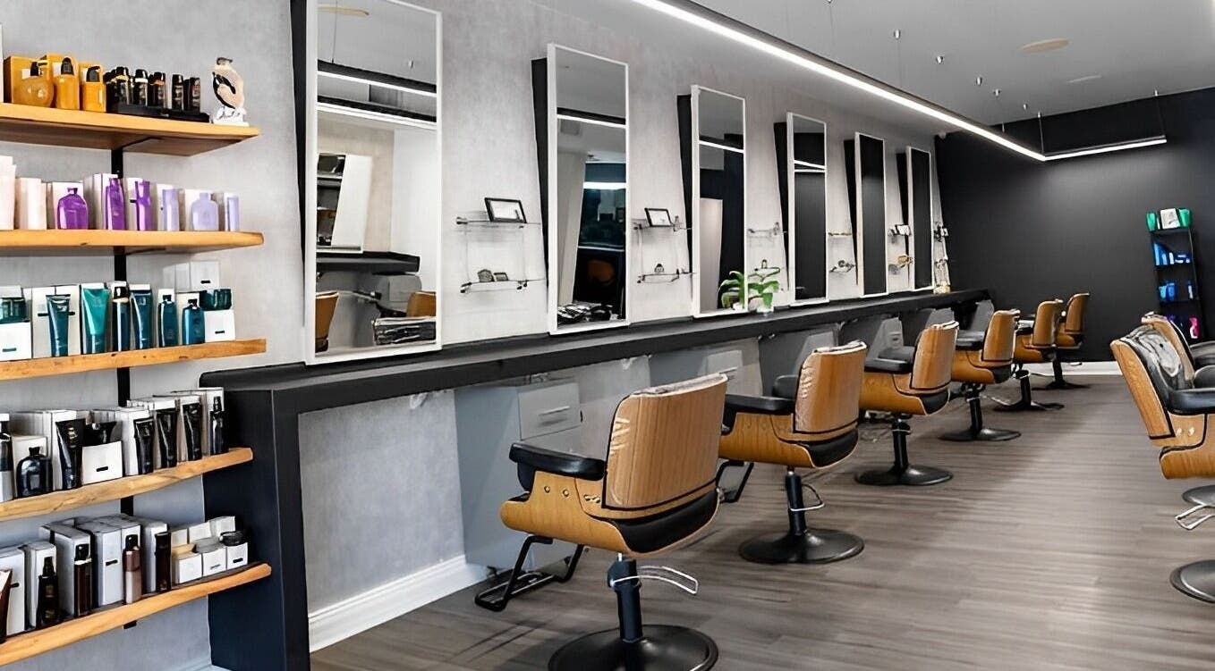 Sleek seating and product display at ACoLab Salon in Winter Park, Florida, US.