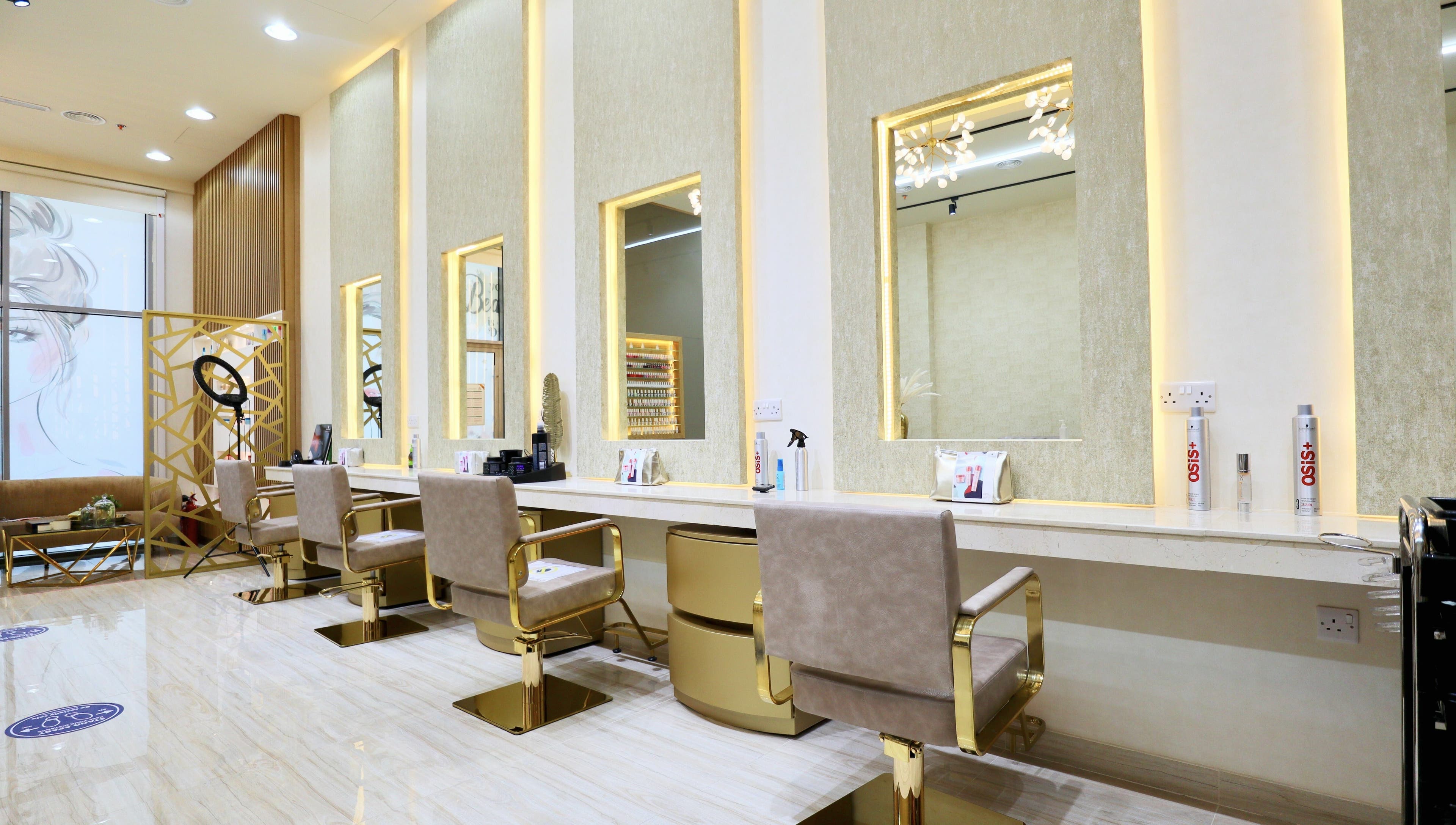 Elegant interior of Amber Beauty Salon | Meydan, Dubai, Dubai, AE with plush seating and soft lighting.