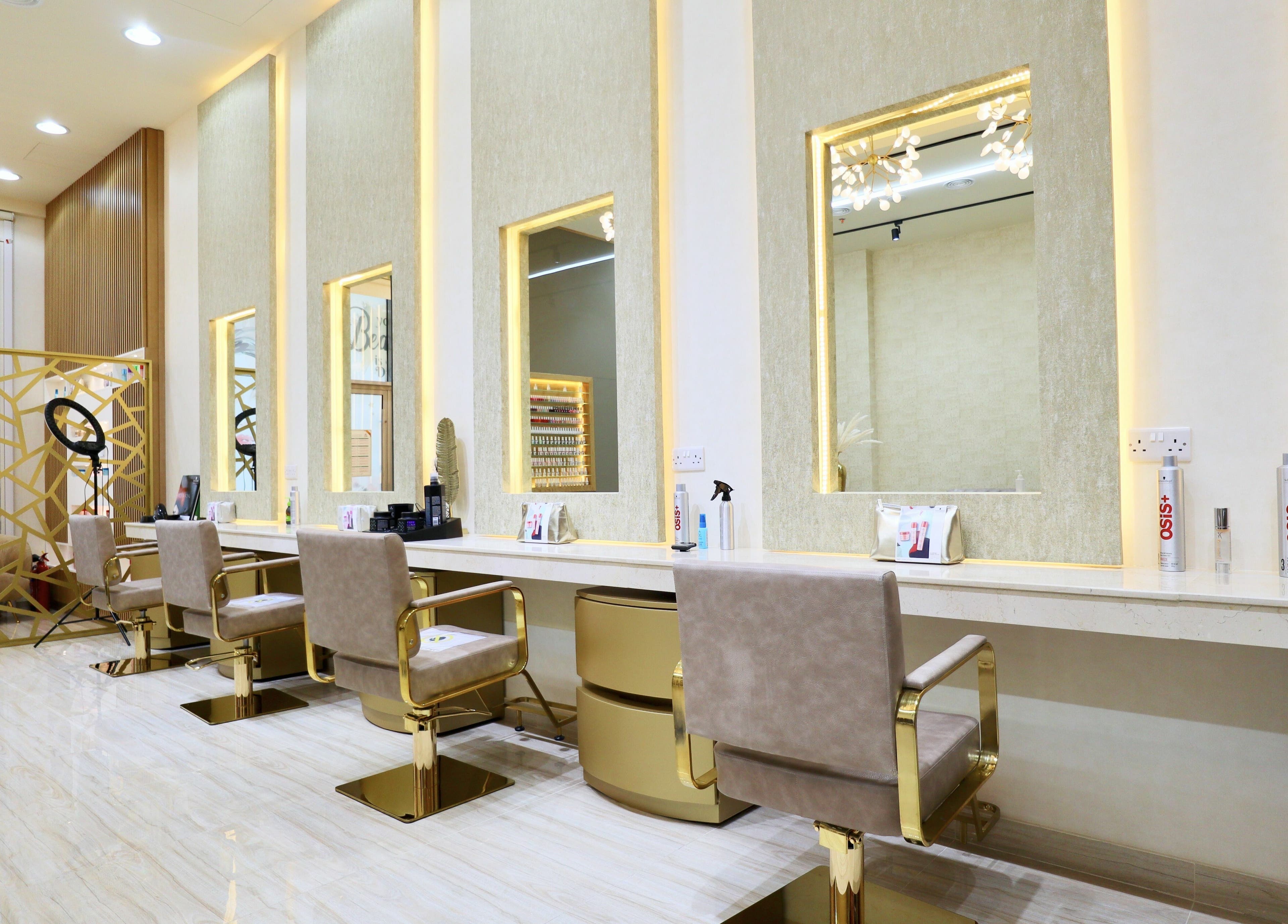Elegant interior of Amber Beauty Salon | Meydan, Dubai, Dubai, AE with plush seating and soft lighting.
