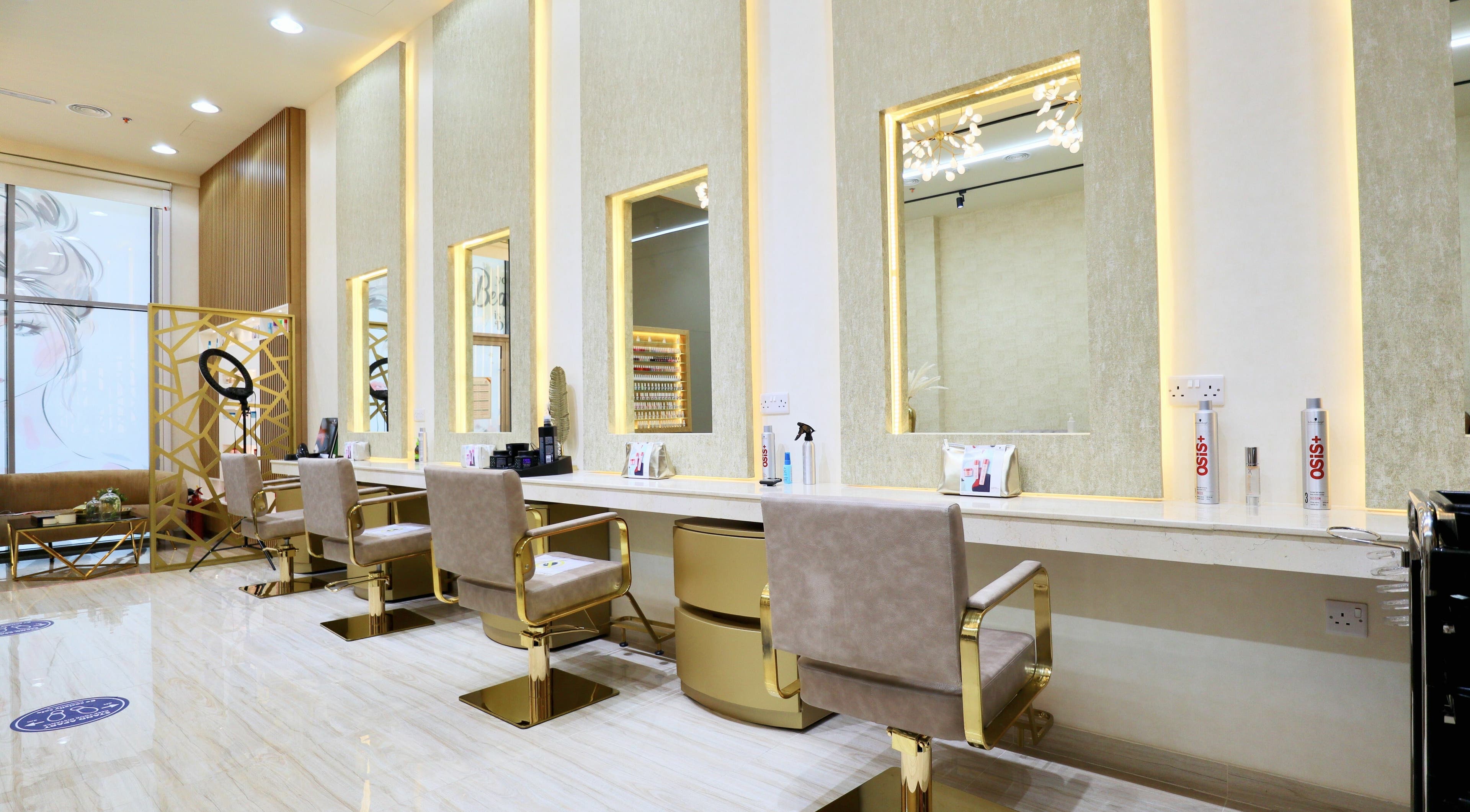 Elegant interior of Amber Beauty Salon | Meydan, Dubai, Dubai, AE with plush seating and soft lighting.