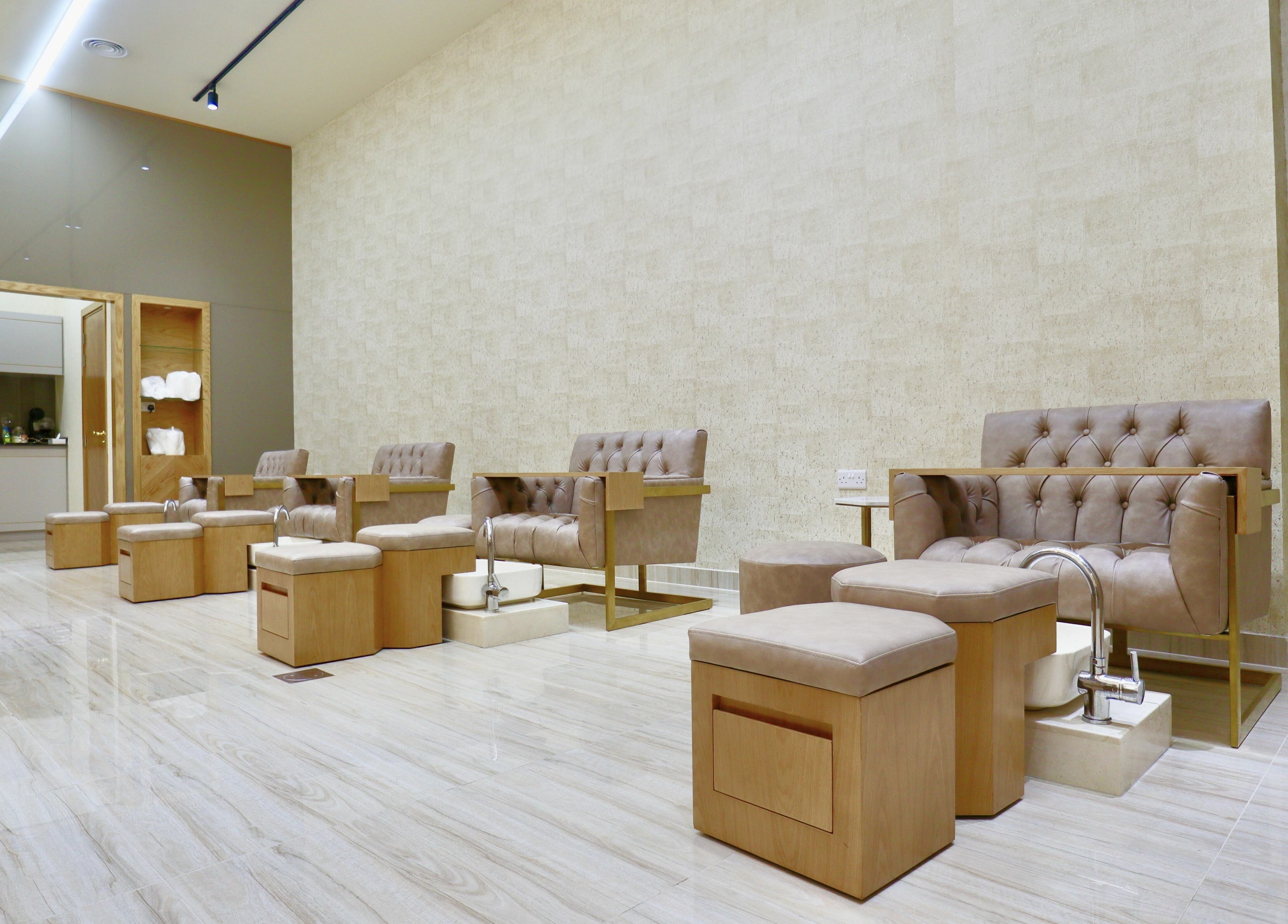 Luxurious pedicure chairs at Amber Beauty Salon | Meydan, Dubai, Dubai, AE offer comfort and style in a serene setting.