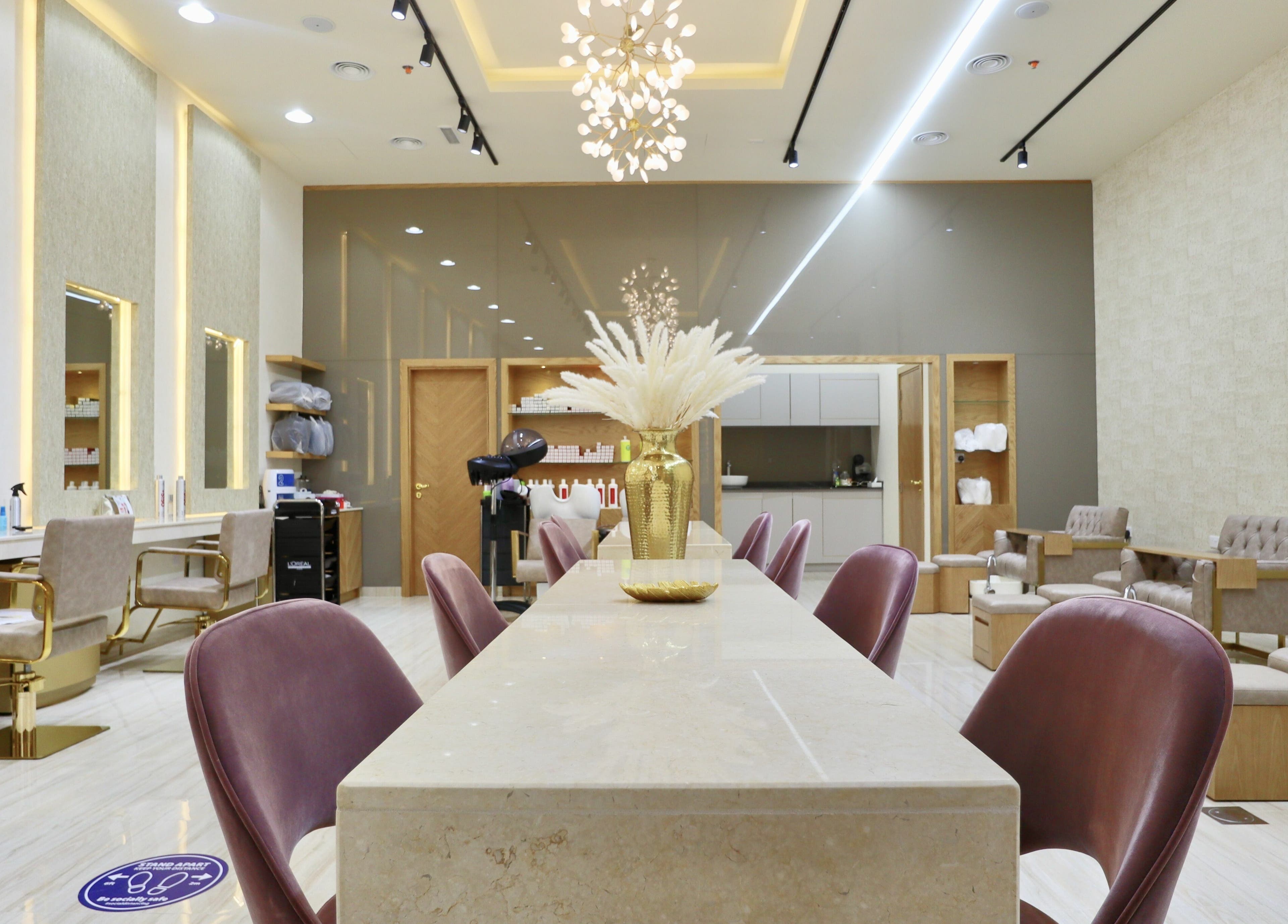 Elegant interior of Amber Beauty Salon | Meydan, Dubai, Dubai, AE with plush seating and chic decor.