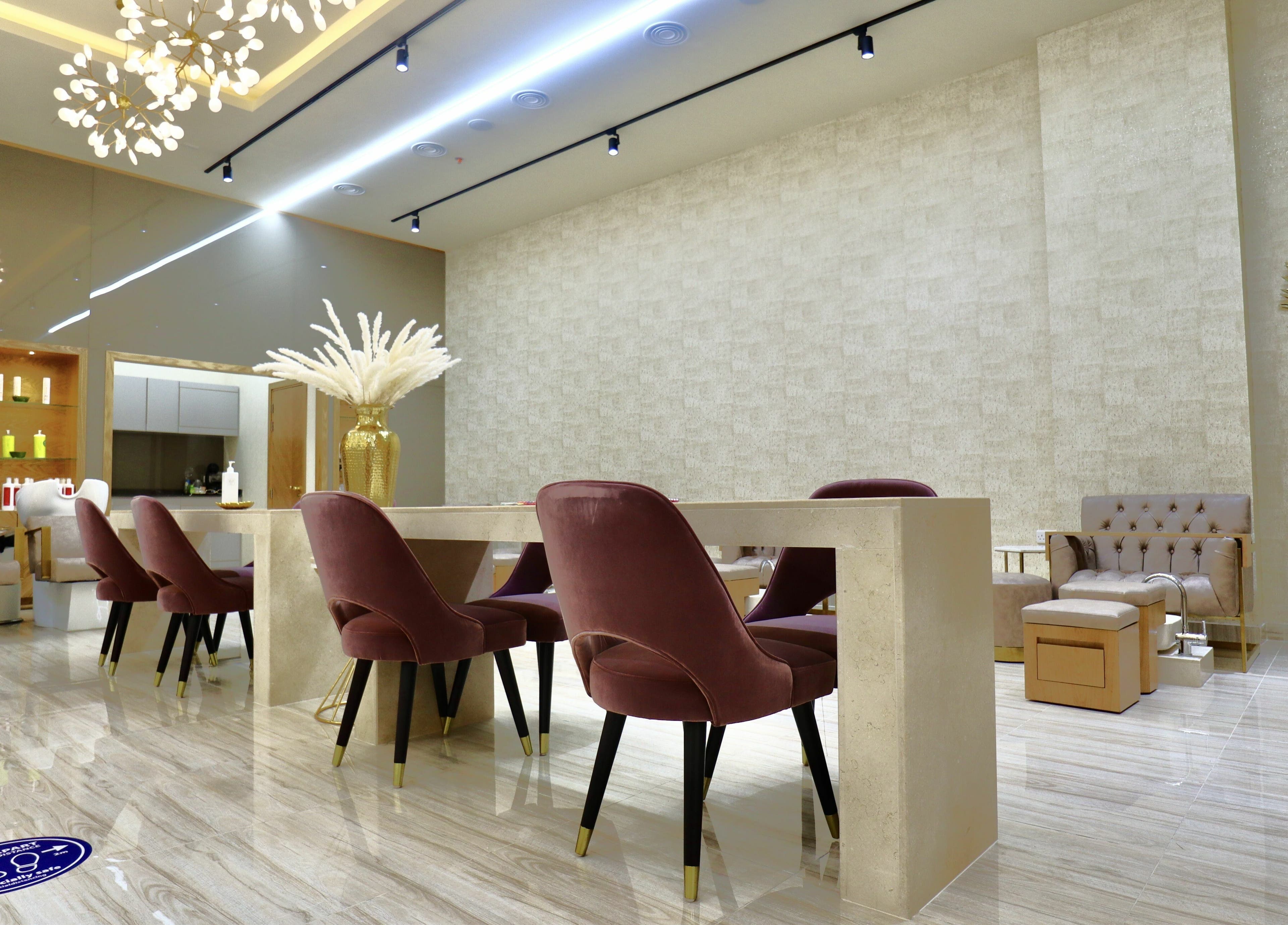 Chic interior of Amber Beauty Salon | Meydan in Dubai, Dubai, AE with plush seating and modern decor.