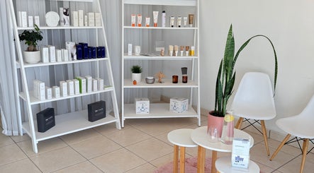 Product shelves at Derma Aesthetics, Walvis Bay, Erongo Region, NA showcasing beauty and skincare items.